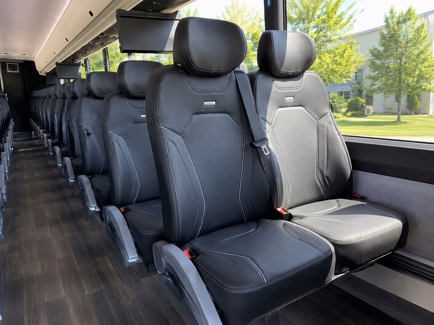 use a charter bus to transport wedding guests to venues along the great falls historic district